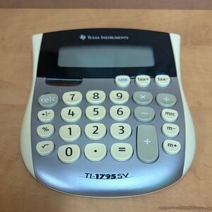 Texas Instruments TI-1795 SV Calculator - Silver and Cream